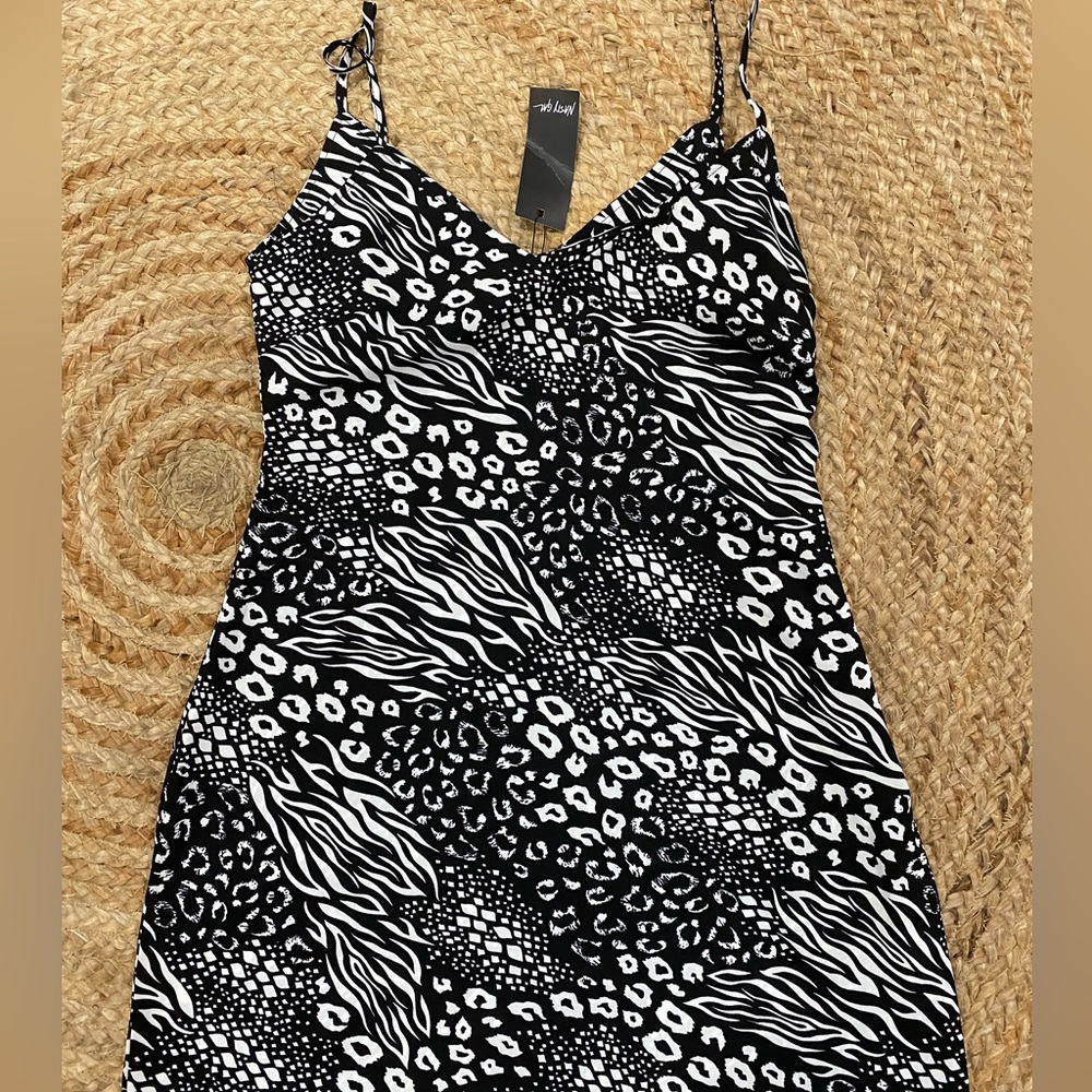 Mixed animal print dress. Brand new, tags still attached.